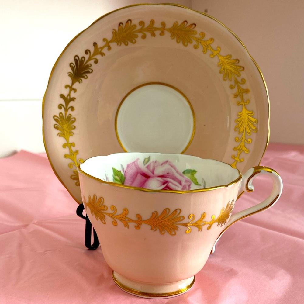 Aynsley Teacup and Saucer in a Pink Main Colour with Gold And a Cabbage Rose